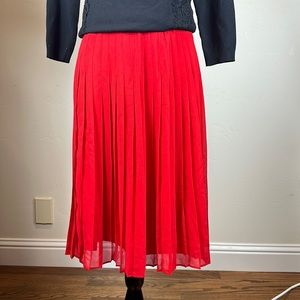 Ann Taylor pleaded skirt size 4